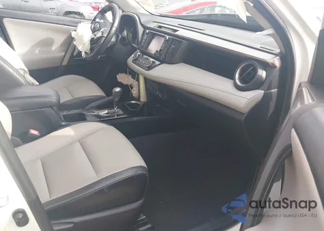2017 Toyota Rav4 Limited z USA, uszkodzony, nr VIN JTMYFREV5HJ720426